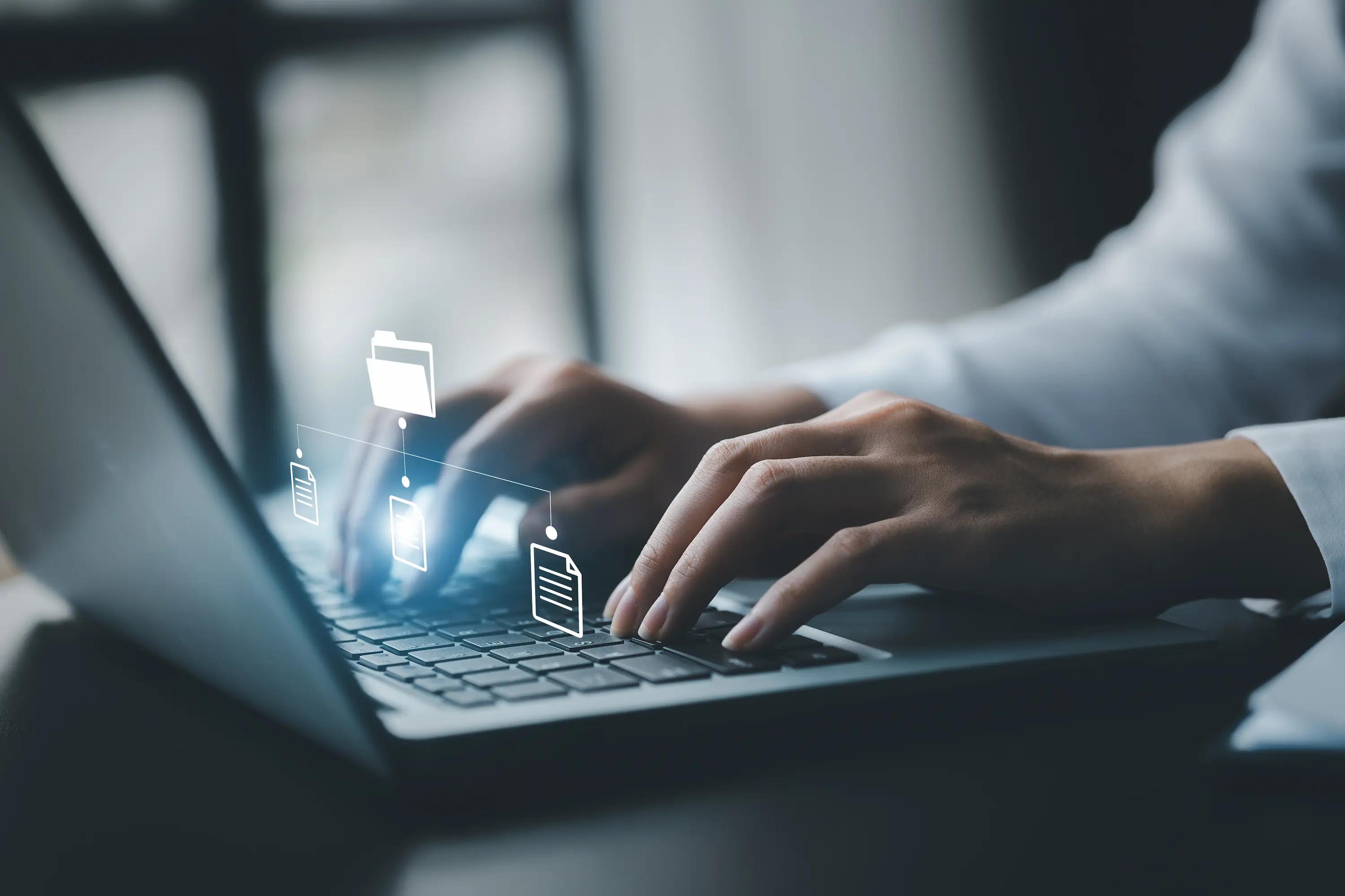 business-man-typing-on-a-keyboard-with-holograms-trustID